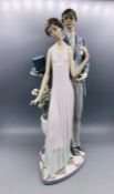 Lladro figure of a Lady and Gent in evening dress and top hat and tails.AF