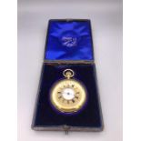 A Russells Limited of Liverpool Half Hunter pocket watch in 18ct gold, in original box
