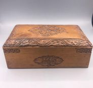 A Carved cigarette box