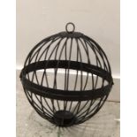 A Cast Iron circular candle holder