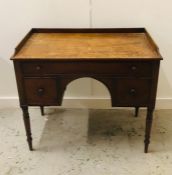 A George III Ladies writing desk, mahogany on turned legs.