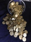 Large quantity of brass three penny bits