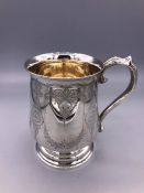 A silver, hallmarked tankard, Makers mark H & T Birmingham 1879 (202g)