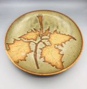 A Stoneware Autumnal themed plate