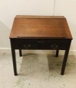 A Mahogany fall fronted Masters desk with two front drawers, brass drop handles.