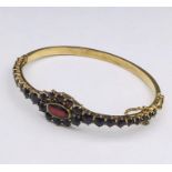 A Vintage Garnet and 9ct gold bracelet.