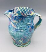 A Small Green And Blue Pottery Jug Signed By Pru Galla Chilc