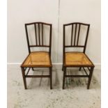Two cane seated chairs, one as found.