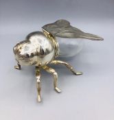 A silver plated and glass bee shaped Honey Pot