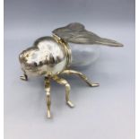 A silver plated and glass bee shaped Honey Pot