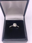 An 18ct white gold brilliant cut diamond of 90 points