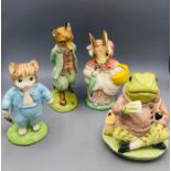 A selection of four Beswick Ware Beatrix Potter figures to include Jeremy Fisher in original boxes