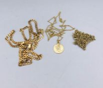 Three 9ct yellow gold chains One AF and one with a St Christopher (18.2g)