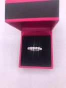 An 18ct white gold five stone diamond ring of 50 points