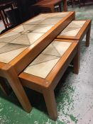 A Mid Century tile topped coffee table with matching side tables.