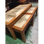 A Mid Century tile topped coffee table with matching side tables.