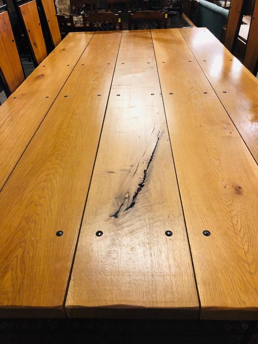 A Large Dining Table consisting of five large plank.s on a steel base with ten dining chairs. - Image 4 of 5