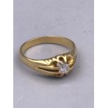 A Solitaire Diamond in an 18ct yellow gold setting