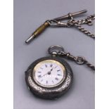 A Silver pocket watch and silver Albert chain