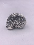 A Silver Plated Vesta Case In The Form Of A Small Shell