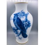 A Japanese Okura vase, in original case.