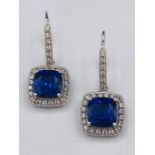 A Pair of earrings synthetic sapphires and diamonds