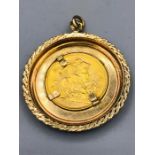 An 1893 gold Sovereign in a 9ct gold mount.(14g)