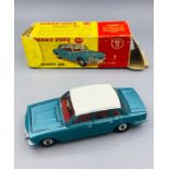 A Dinky Toys Triumph 2000 135 diecast car.