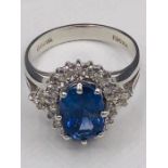 A Sapphire and Diamond ring in 14ct white gold.