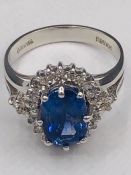 A Sapphire and Diamond ring in 14ct white gold.