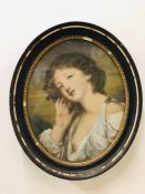 A Portrait of a Lady in a classical style, in an oval frame.