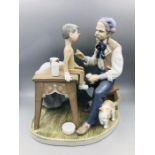 Lladro figure of Pinocchio and Geppetto.