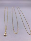 Three 9ct gold necklaces (7.3g)