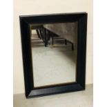A Black framed mirror
