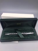 A cased Concorde Cross pencil