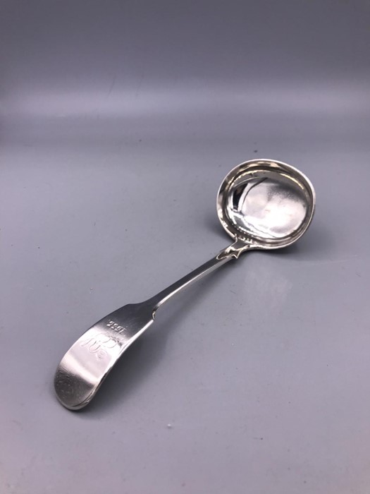 A sauce ladle makers mark GMJ 1886-87.