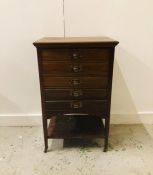 A Mahogany music cabinet with drop front drawers 52cm w x 38cm d x 84cm h