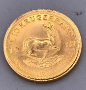 A 1981 1/10th of a Krugerand coin