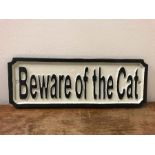 A Cast Iron sign Beware of The Cat.
