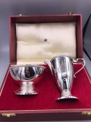 An Asprey silver jug and sugar bowl in original case and box