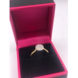 An 18ct yellow gold diamond cluster ring of 50 points approx