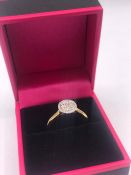 An 18ct yellow gold diamond cluster ring of 50 points approx