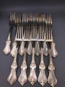 Twelve Swedish hallmarked forks (820g) by C G Halberg of Stockholm