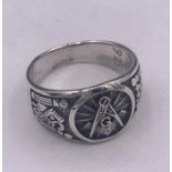 A gnt silver ring with masonic image