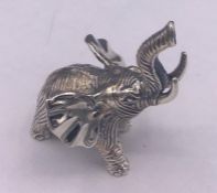 A silver figure of an elephant