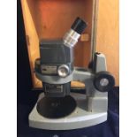 A Cased Microscope