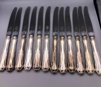 A selection of twelve silver handled Swedish knives