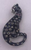 A silver and enamel leopard style brooch