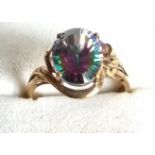 A 9ct yellow gold ring set with a mystic topaz stone, size P, 3.28g