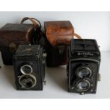 A 1932 Franke & Heidecke Braunschweig Rolleiflex Compur camera, and a 1930s Voigtlander Brilliant